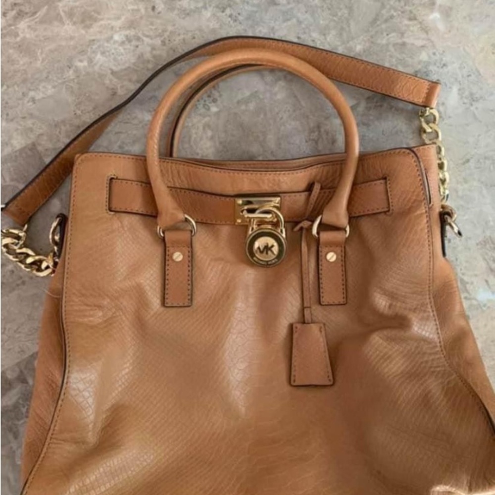 Camel colored Michael Kors medium sized bag. Great condition!